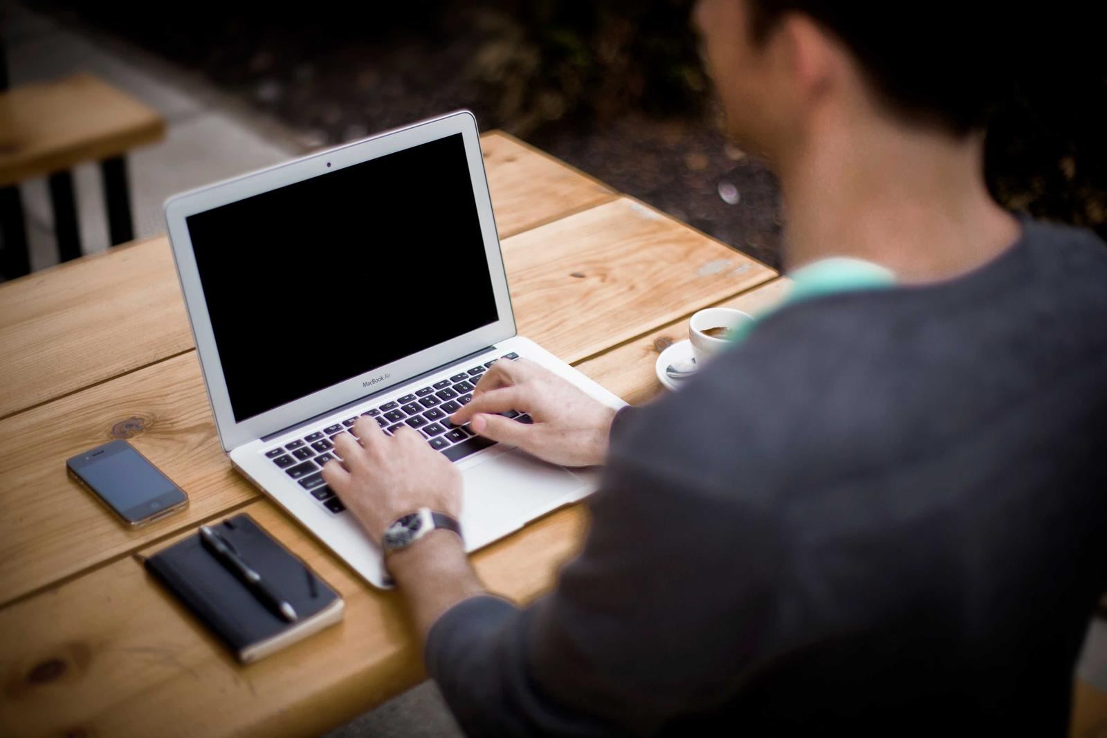 A developer working on a laptop